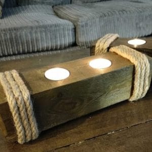 Handcrafted African candle holder with wooden base